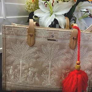 Spartina purse with inside pockets, zipper and Turquoise & Red tassel